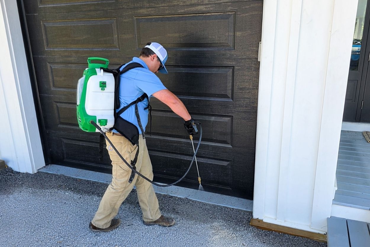 TruNorth pest control technician treating a home in Acworth GA