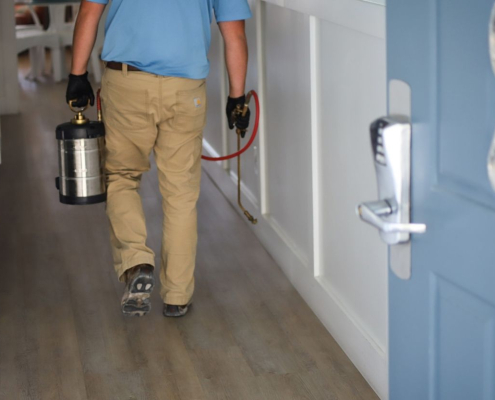 TruNorth Pest Control technician inspecting a rental property in Fort Myers FL